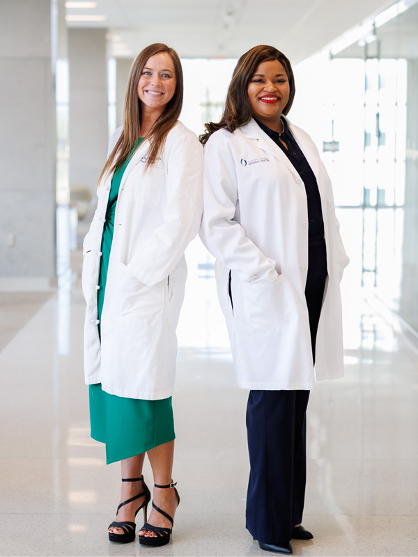A portrait of UMMC Family Medicine Residency program chief residents Anna McCoy, MD and Kiara Richardson, MD.
